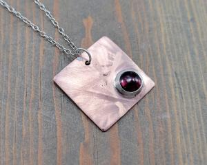 square copper and gemstone pendant