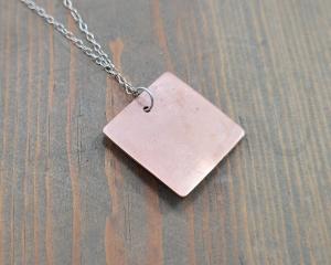 unadorned copper pendant back