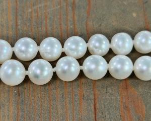 hand knotted pearls with white silk
