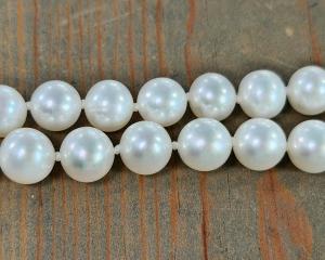 hand knotted pearls with white silk