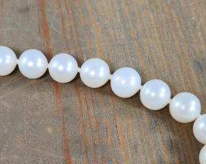 hand knotted white pearls with silk thread