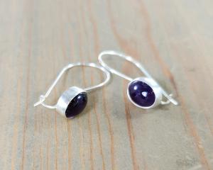 Sterling silver kidney wire earrings with oval amethyst