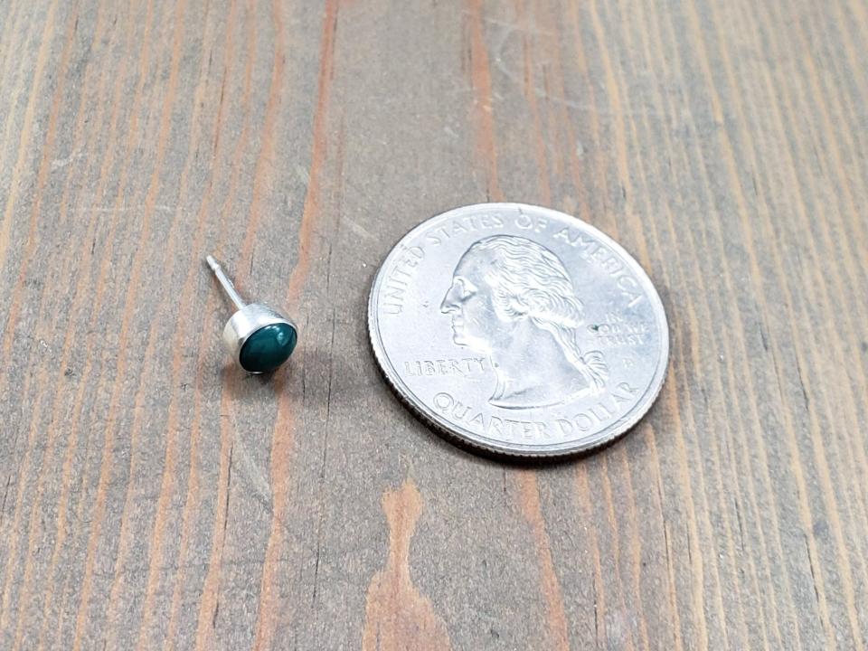 one tiny turquoise earring