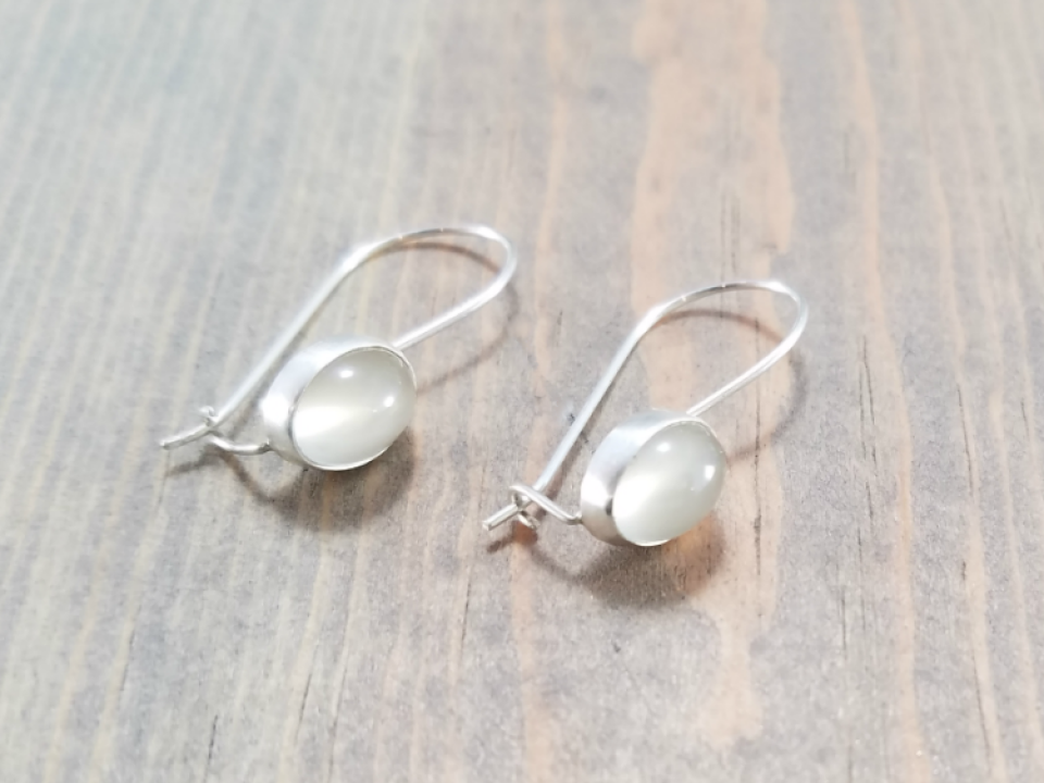 White gemstone earrings