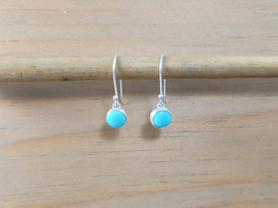 small turquoise drop