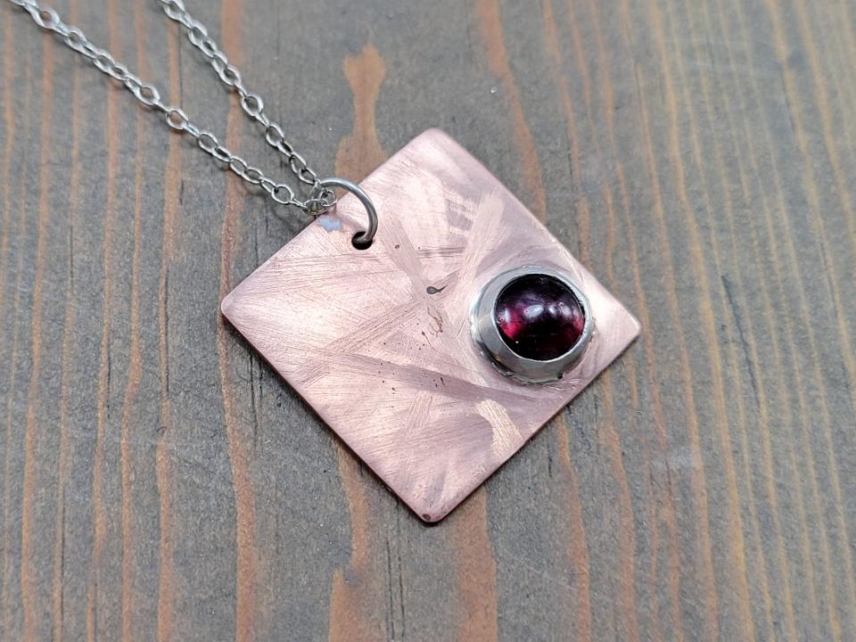 square copper and gemstone pendant