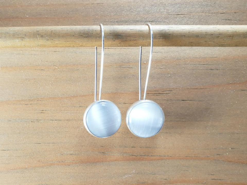 white dangle earrings