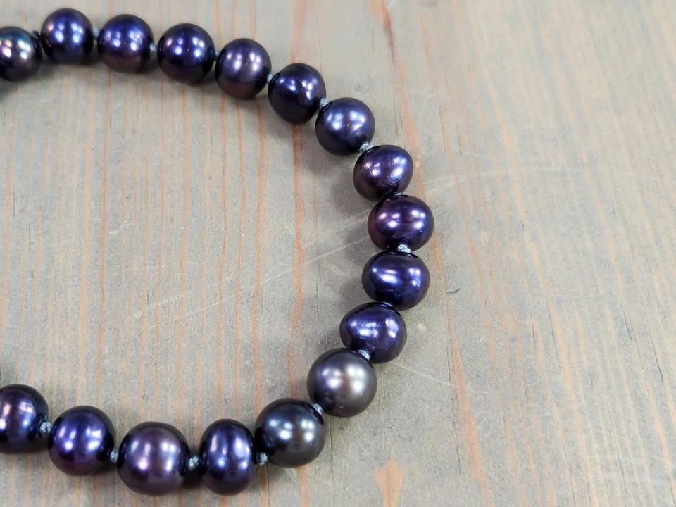 purple peacock pearls