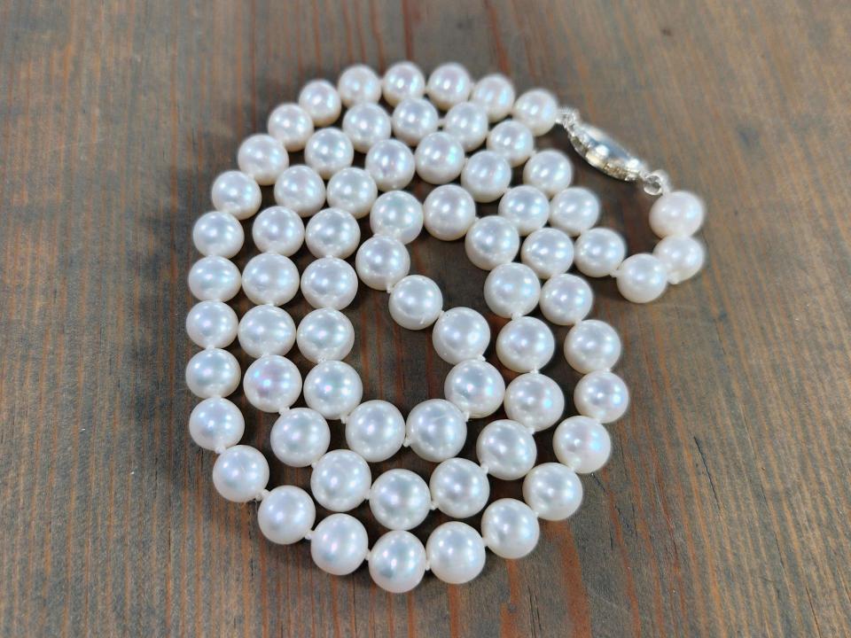 Hand knotted discount pearl necklace