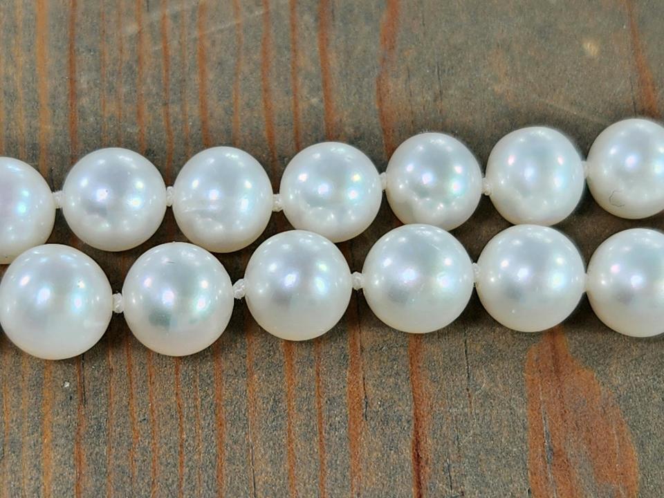 hand knotted pearls with white silk
