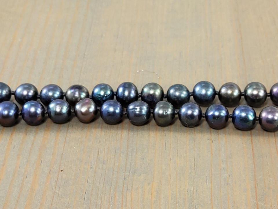 hand knotted peacock pearls