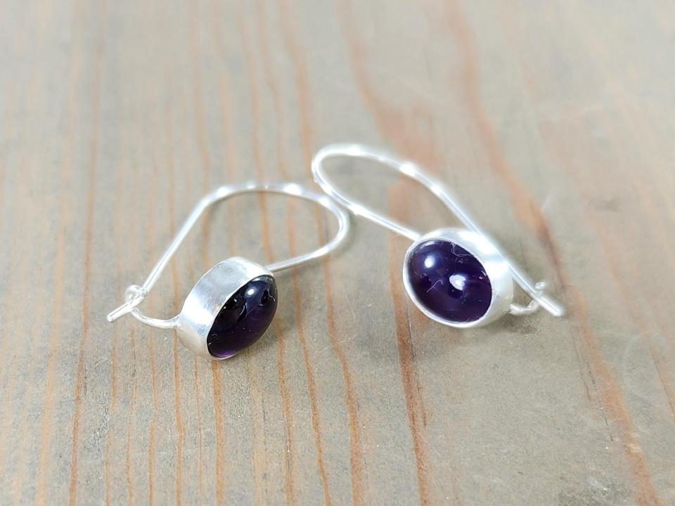 Sterling silver kidney wire earrings with oval amethyst