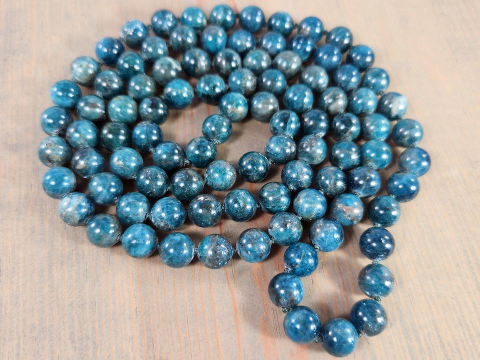 long endless single strand beaded necklace