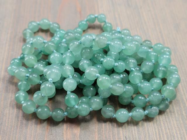 Endless green bead necklace